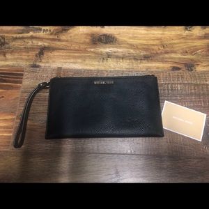 Authentic Michael Kors black leather large clutch